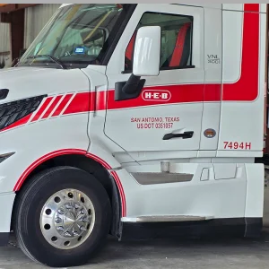 Commercial full vehicle wrap installation on a service van by X Graphics Printing in Houston, TX